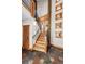 Entryway features wooden staircase, slate flooring, and natural wood accents at 19 South Rd, Breckenridge, CO 80424