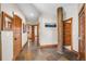 Hallway features tile flooring, wood trim and doors, and a unique structural support at 19 South Rd, Breckenridge, CO 80424
