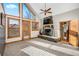 Bright living room showcasing a stone fireplace, vaulted ceilings, and natural light at 19 South Rd, Breckenridge, CO 80424