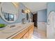 Elegant bathroom with double vanities and a modern aesthetic at 4401 S Lincoln St, Englewood, CO 80113