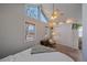 Bedroom with vaulted ceilings, window, and built-in closet at 4401 S Lincoln St, Englewood, CO 80113