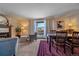 Cozy dining area with hardwood floors and a view to the front yard at 4401 S Lincoln St, Englewood, CO 80113