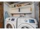 Functional laundry room with stacked washer and dryer at 4401 S Lincoln St, Englewood, CO 80113