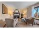 Living room with fireplace and comfortable seating at 4401 S Lincoln St, Englewood, CO 80113