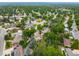 Beautiful aerial view of a residential area with tree-lined streets and well-kept lawns at 2276 S Dover Way, Lakewood, CO 80227