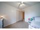 Bedroom featuring natural light, plush carpeting, and a closet at 2276 S Dover Way, Lakewood, CO 80227