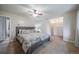 Large bedroom with carpet, ceiling fan, and closet with Primary bed at 2276 S Dover Way, Lakewood, CO 80227