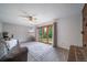 Comfortable living room featuring sliding glass doors, neutral colors, and a cozy atmosphere at 2276 S Dover Way, Lakewood, CO 80227
