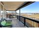 Enjoy the covered balcony with its breathtaking lake and landscape views at 5895 E Conservation Dr, Frederick, CO 80504