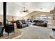 Large bonus room with a billiard table, fireplace, and comfortable leather seating at 5895 E Conservation Dr, Frederick, CO 80504