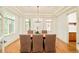 Bright dining room featuring modern lighting, hardwood floors, and ample seating at 958 S Columbine St, Denver, CO 80209