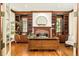 Sophisticated home office featuring custom built-ins, hardwood floors, and natural light at 958 S Columbine St, Denver, CO 80209