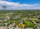 Bird's eye view of the home and neighborhood, near Lee Gulch Trail and Ashbaugh Park with many mature trees at 1579 W Costilla Pl, Littleton, CO 80120