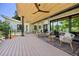 Inviting back deck with patio furniture and scenic view provides relaxation and outdoor entertaining at 1579 W Costilla Pl, Littleton, CO 80120