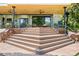 Inviting back deck with scenic staircase and railing provides outdoor entertainment and relaxation at 1579 W Costilla Pl, Littleton, CO 80120