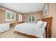 Cozy bedroom with built-in desk, and shelving that offers functional style and scenic views at 1579 W Costilla Pl, Littleton, CO 80120