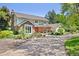 Exterior of this lovely two-story home showcasing the architecture and front yard landscaping, perfect for curb appeal at 1579 W Costilla Pl, Littleton, CO 80120