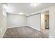 Finished basement featuring neutral paint and carpet with plenty of usable space at 12020 E Canal Dr, Aurora, CO 80011