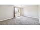 Bright, carpeted bedroom with natural light at 12020 E Canal Dr, Aurora, CO 80011