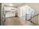 Open kitchen with granite countertops, and stainless steel appliances adjoining to the living area at 12020 E Canal Dr, Aurora, CO 80011
