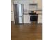 Modern kitchen with stainless steel appliances and granite countertops at 12020 E Canal Dr, Aurora, CO 80011