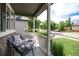 Relaxing front porch features comfortable seating and views of the street, perfect for unwinding outdoors at 3027 Walnut Grove St, Erie, CO 80516