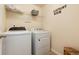 Practical laundry room with washer, dryer, and storage space for household needs at 3027 Walnut Grove St, Erie, CO 80516