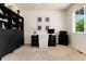 Well-lit office features neutral décor, functional furniture, and a calming view, perfect for a productive workspace at 3027 Walnut Grove St, Erie, CO 80516