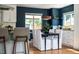 Cozy dining area with ample sunlight, modern lighting, and stylish accents at 1650 S Holly St, Denver, CO 80222