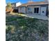 Large backyard with patio and grassy area at 4063 S Himalaya Way, Aurora, CO 80013