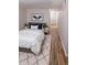 Cozy bedroom featuring stylish decor, comfortable bed, and ample natural light for a relaxing retreat at 7255 E Quincy Ave # 205, Denver, CO 80237