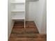 Well-organized closet with shelving provides ample storage space in this home at 7255 E Quincy Ave # 205, Denver, CO 80237