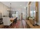 Spacious dining area with unique chandelier, large windows, and stylish decor at 354 Milwaukee St, Denver, CO 80206