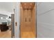 Interior view of the private elevator in the home with wood paneling and hardwood floors at 354 Milwaukee St, Denver, CO 80206