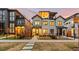 Modern home with a well-manicured front yard and a charming black fence at 354 Milwaukee St, Denver, CO 80206