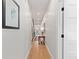 Bright hallway with hardwood floors and modern lighting at 354 Milwaukee St, Denver, CO 80206