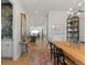 Open-concept hallway with view of dining area, kitchen, and bathroom at 354 Milwaukee St, Denver, CO 80206