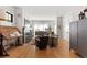 Spacious living room with a fireplace, hardwood floors, and comfortable seating furniture at 354 Milwaukee St, Denver, CO 80206