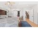 Airy main bedroom with a closet, hardwood floors, ceiling fan and ensuite bathroom at 354 Milwaukee St, Denver, CO 80206