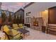 Cozy outdoor patio with fireplace, comfortable seating, and privacy fence at 354 Milwaukee St, Denver, CO 80206