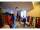 Basement with many clothes and storage racks at 9950 Sydney Ln, Highlands Ranch, CO 80130