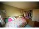 Bedroom featuring a large closet, and neutral colored walls at 9950 Sydney Ln, Highlands Ranch, CO 80130