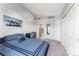 Bedroom with closet, desk, and attached bathroom at 8671 E Dry Creek Rd # 721, Englewood, CO 80112