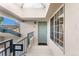 Exterior of condo with door and large window at 8671 E Dry Creek Rd # 721, Englewood, CO 80112