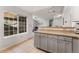 Open kitchen layout with long counters and natural light at 8671 E Dry Creek Rd # 721, Englewood, CO 80112