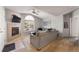 Bright living room featuring a fireplace, vaulted ceilings, and large window at 8671 E Dry Creek Rd # 721, Englewood, CO 80112