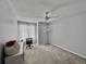 Well-lit bedroom with desk area and ceiling fan at 17037 E Wiley Pl, Parker, CO 80134