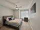 Bedroom featuring ceiling fan, window, and carpeted floors at 17037 E Wiley Pl, Parker, CO 80134