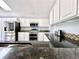 Close-up of kitchen featuring stainless steel appliances and granite countertops at 17037 E Wiley Pl, Parker, CO 80134