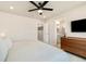 Spacious bedroom leading to bath, with modern decor and large window at 8586 Holman Ct # A, Arvada, CO 80005